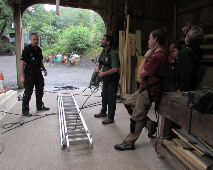 Height ladder safety trainer demonstrating safe use of ladders and stepladders